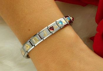 Elegancka zawieszka Link Nomination Charms z 18-karatowego złota w kształcie czerwonego serca model 030613 05. Oryginalna biżuteria Nomination Italy – idealny prezent dla ukochanej osoby..jpg